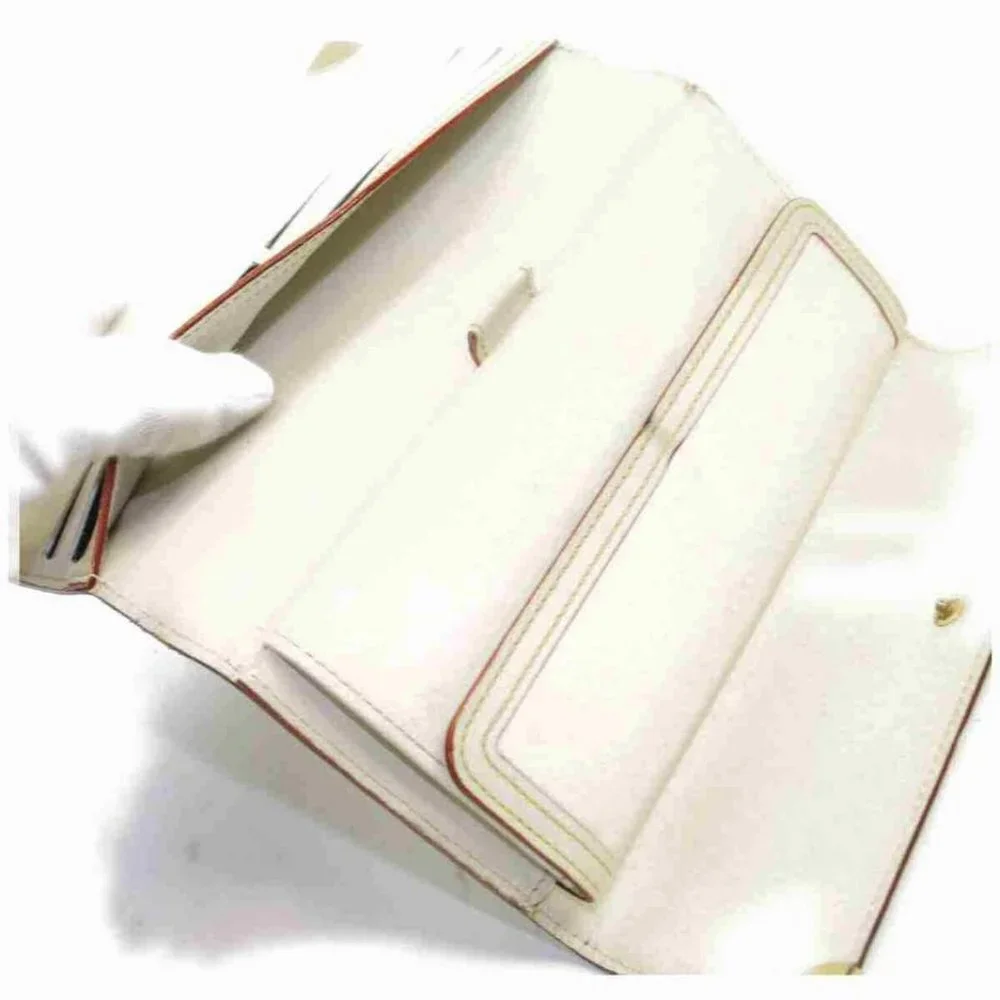 Louis Vuitton Suahli Leather Portefeuille Tresor